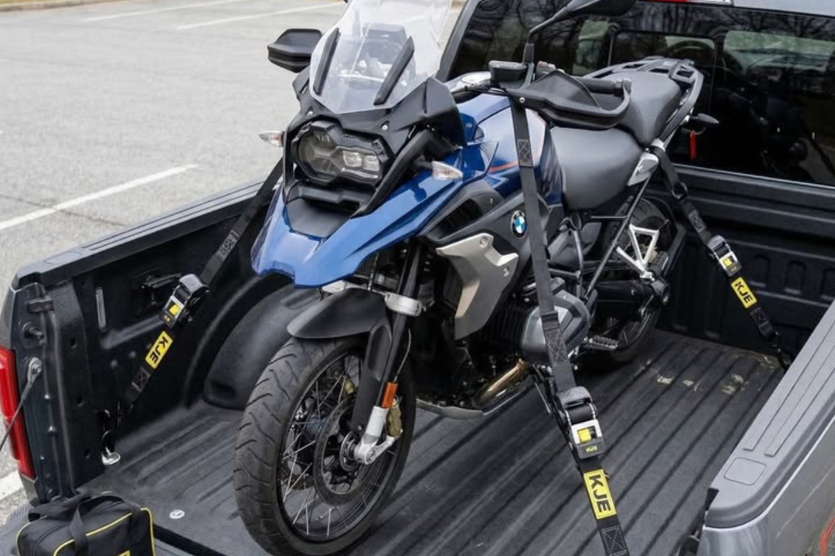 Motorcycles and powersport vehicles being loaded for transport